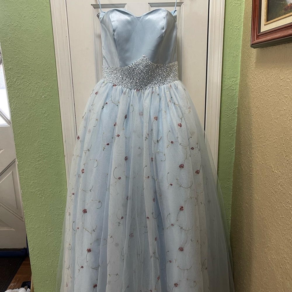 Sky blue floor length dress.